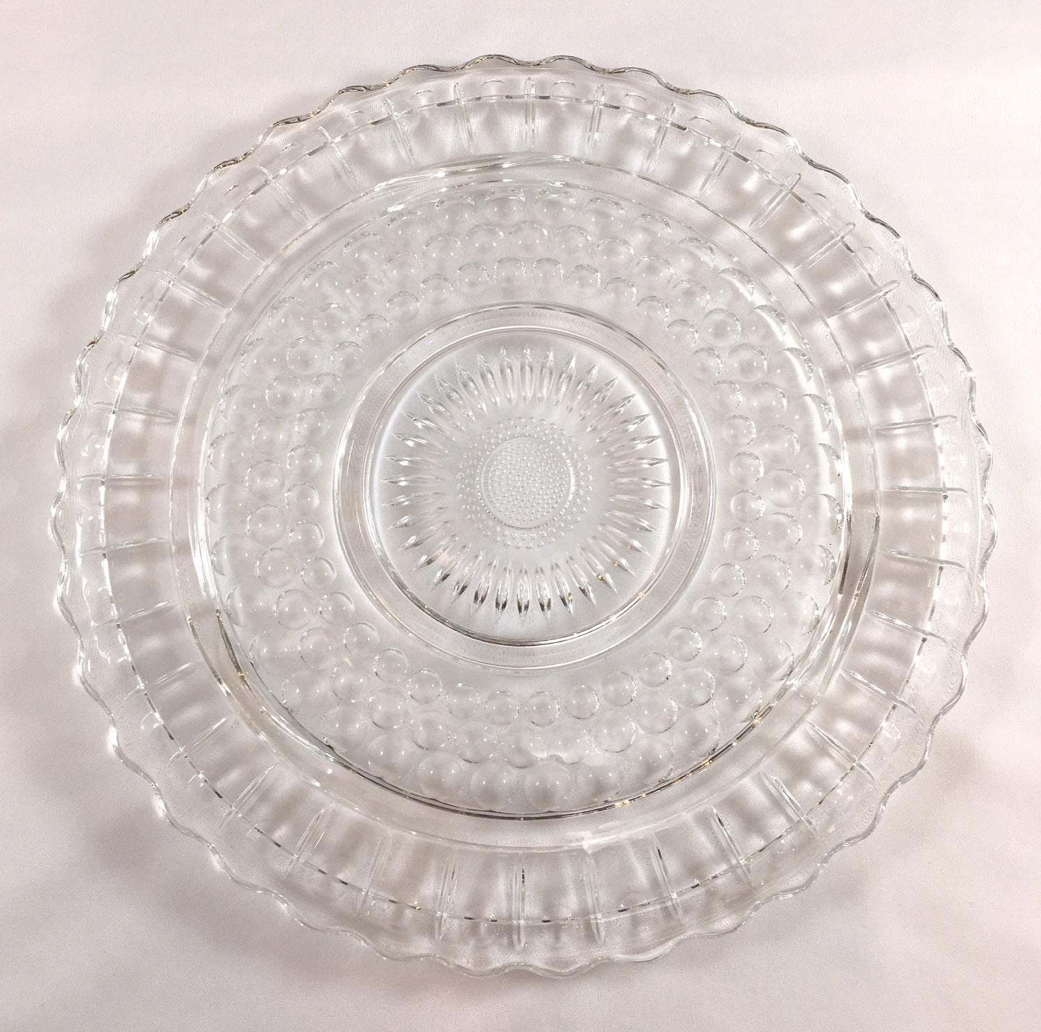 Clear glass outlet cake plate