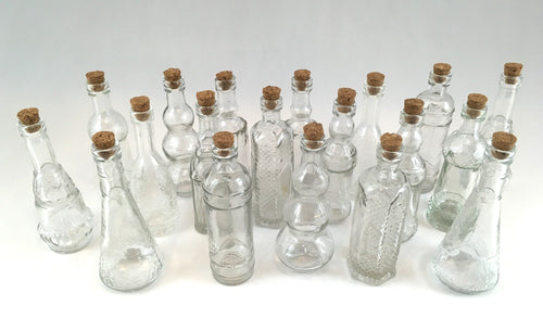 Clear glass bottles with corks