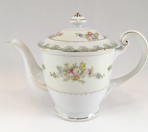 White and Cream Teapot with Floral Pattern