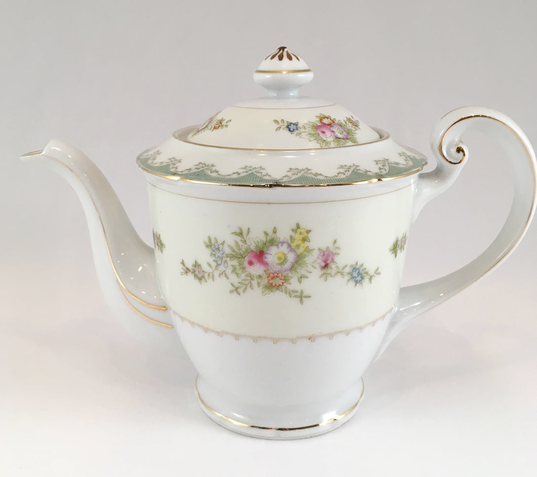 White and Cream Teapot with Floral Pattern